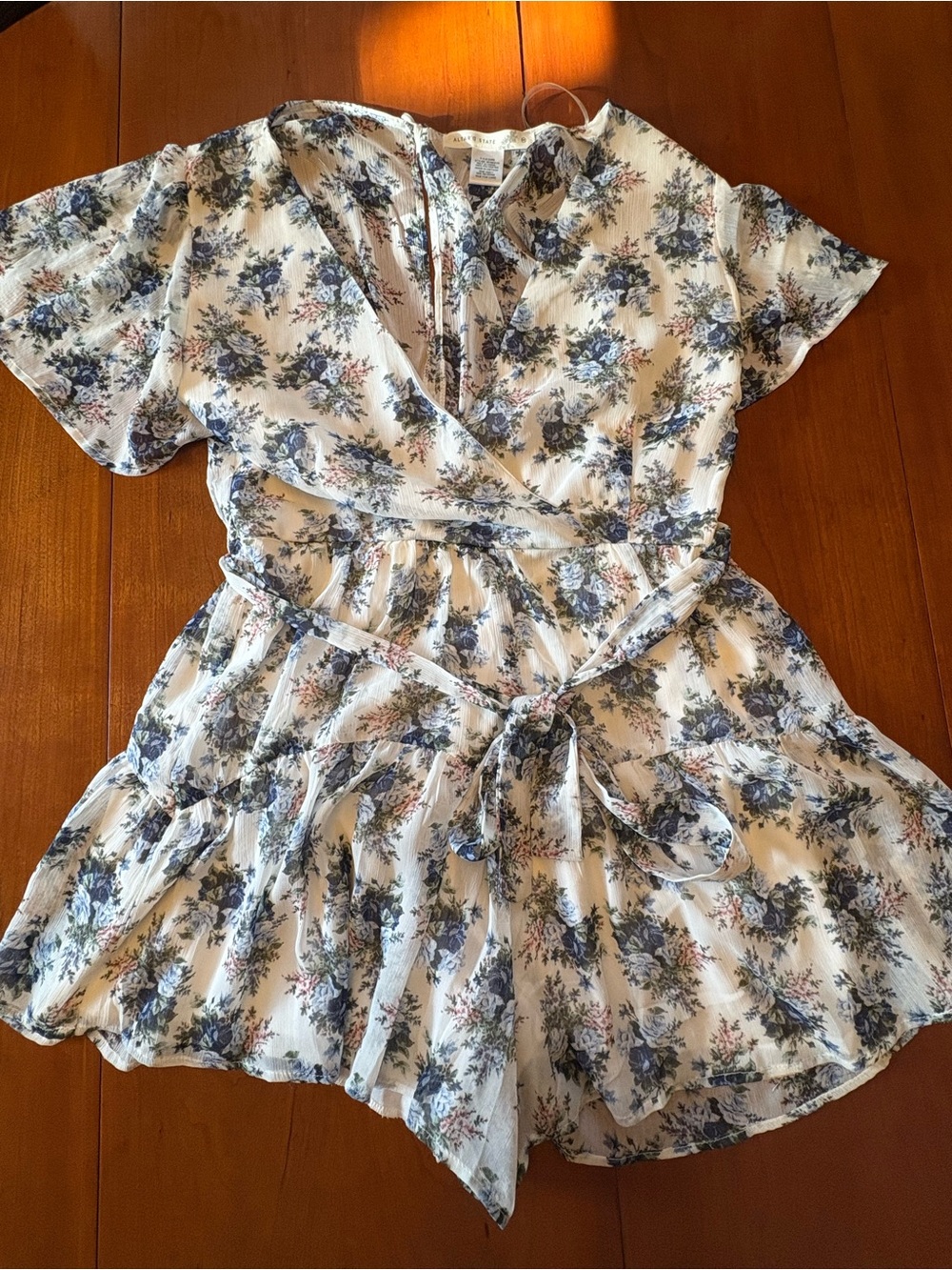Altar'd State Cream Floral Wrap Romper with Blue Garden Print